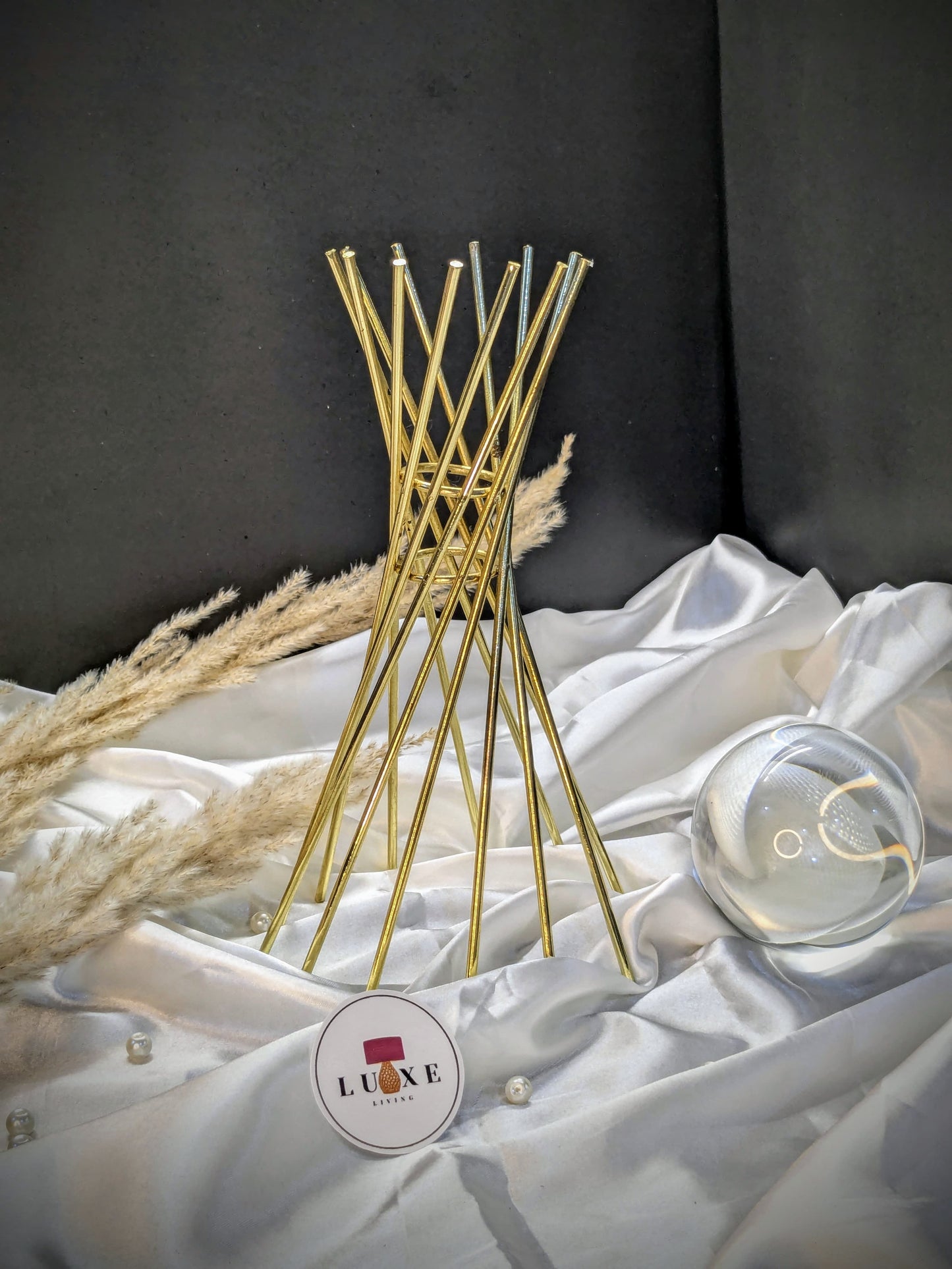 Crystal sphere with twisted gold stand